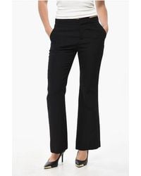 Balmain - Flared-Fit Trousers With Concealed Button Closure - Lyst