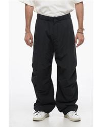 Studio Nicholson - Drawstring Nylon Padded Trousers - Lyst
