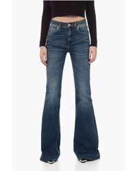 Alexander McQueen - Flared Denims With Delavè Effect - Lyst