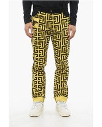 Balmain - Pokemon Two-Tone Jeans With Cuffed Hem And All-Over Monogram - Lyst