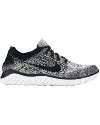 nike free run flyknit womens black and white