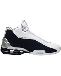 nike shox bb4 black university gold