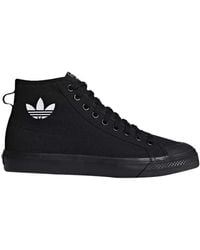 black and white adidas high tops womens