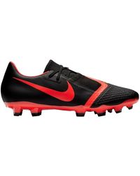 Calzado de fútbol para pasto artificial Nike Phantom Venom .