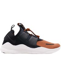 nike free rn commuter muted bronze