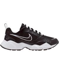 nike white and black air heights trainers