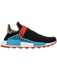 human race shoes blue and yellow
