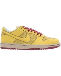low dunks yellow
