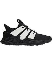 all black adidas prophere