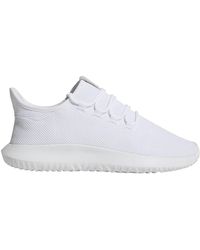 white adidas tubular shoes