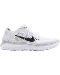 Nike Free Rn Flyknit Sneakers for Women - Up to 25% off at Lyst.com