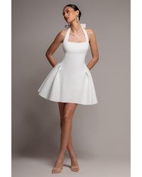 Goddiva - Corset Fit And Flare Halter Neck Skater Mini Dress - Lyst