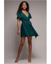 Goddiva - Flutter Sleeve Wrap Mini Dress With Elasticated Waist - Lyst
