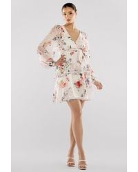 Goddiva - Sustainable Tiered Wrap Floral Mini Dress - Lyst