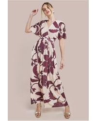 Goddiva - Leaf Print Flutter Sleeve Maxi Dress - Lyst