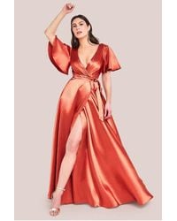 Goddiva - Flutter Sleeve Wrapover Satin Maxi Dress - Lyst