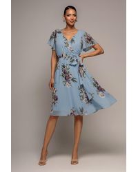 Goddiva - Sustainable Floral Print Midi Wrap Dress With Flutter Sleeves - Lyst
