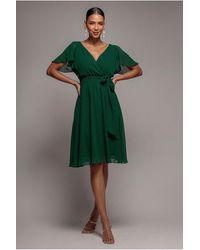 Goddiva - Sustainable Flutter Sleeve Chiffon Wrap Midi Dress - Lyst