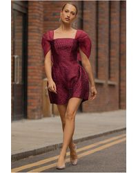 Goddiva - Lace Up Jacquard Mini Dress With Organza Wings - Lyst