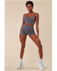 Cosmochic - Cropped Bralette & Cycle Short Set - Lyst