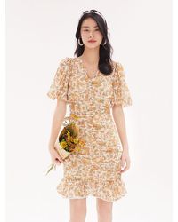 GOELIA - Ruched V-Neck Puff Sleeve Floral Mini Dress - Lyst