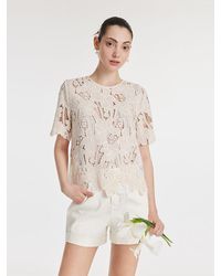 GOELIA - Lace Floral-Shaped Openwork Blouse With Bottomed Camisole - Lyst