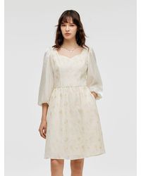 GOELIA - Lantern Sleeve Patchwork Jacquard Mini Dress - Lyst