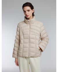 GOELIA - [Preview] Stand Collar Lightweight Goose Down Jacket - Lyst