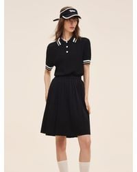 GOELIA - Tencel Blend Openwork Knit Top And Pleated Skirt Two-Piece Set - Lyst