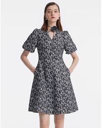 GOELIA - Jacquard Puff Sleeves V-Neck Mini Dress With 3D Rose Belt - Lyst