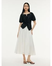 GOELIA - Tencel Blend Twist Front Top And A-Line Skirt Two-Piece Set - Lyst