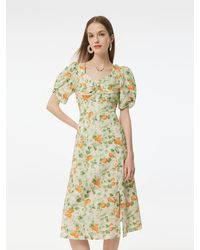 GOELIA - Cotton Floral Print Twist Front Midi Dress - Lyst