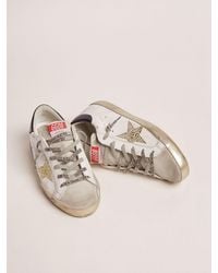 Golden Goose Super-star Ltd Sneakers With Navy-blue Laminated Leather Heel Tab And Swarovski Crystal Star
