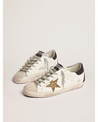 Golden Goose Super-star Sneakers With Gold Star And Glittery Black Heel Tab - Metallic