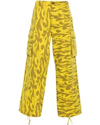 ERL - Pantaloni cargo stampati con fiamme gialle - Lyst