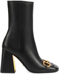 embroidered leather ankle boot with belt