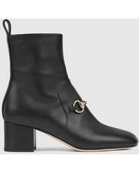 Gucci - ホースビット付き ウィメンズ アンクルブーツ, ブラック, レザー - Lyst