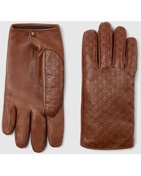 Gucci - Embossed Gg Leather Gloves - Lyst