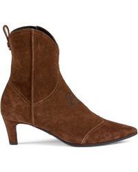 embroidered leather ankle boot with belt gucci