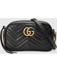 Gucci Kleine GG Marmont Schultertasche aus Matelassé - Schwarz