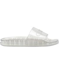 cream gucci slides