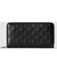 Gucci - Gg Emblem Zip Around Wallet - Lyst