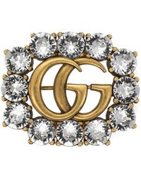 Gucci Doppel G Brosche aus Metall mit Kristallen - Mettallic