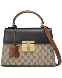 gucci padlock embossed leather tote in black