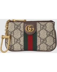 Shop the Gucci Signature key case by Gucci. A key case made in heat  debossed Gucci Signature leather with a defined prin…