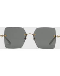 Gucci Quadratische Sonnenbrille aus Metall - Mehrfarbig