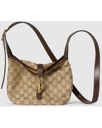 Gucci - Gg Mini Bag With Piston Closure, Gg Canvas - Lyst