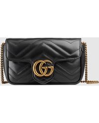 Gucci GG Marmont Super-Mini-Tasche aus Matelassé-Leder - Schwarz