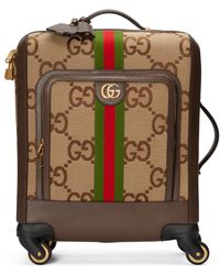 Gucci - Valise à roulettes GG jumbo taille cabine - Lyst