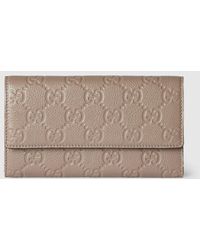 Gucci - Gg Emblem Continental Wallet - Lyst